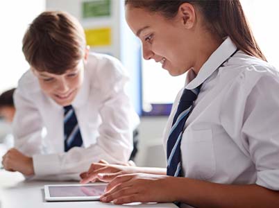 Photo of students using tablet